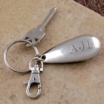 Our Bottle Opener Key Chain is a dual function gift that everyone is sure to enjoy! Whether youre shopping for your bridal party, co-workers or Christmas gifts, this key ring is timeless and will lasts for years. With its sleek dome shaped exterior, this multi-function treat features a bottle opener, key ring and clasp.