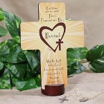 Remember this joyous day when your child received the Holy Sacrament of Communion for the very first time with a Personalized First Communion Wall Cross. A glorious, personalized cross is created just for your child to proudly display in his or her room. Your Custom Printed First Communion Keepsake Cross measures 6 7/8" L x 5 1/4" W. Wooden cross stand is included with every Communion cross. Personalized Cross includes FREE personalization! Personalize your First Communion Wall Cross with any name and First Communion date. 