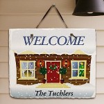 Personalized Christmas Slate Plaque - Personalized Holiday Natural Slate Plaque Decorate your home in holiday cheer with a unique slate plaque featuring a romantic winter scene. A beautiful accent for your home to welcome friends and family during this heartwarming time of the year. Your Personalized Holiday Natural Slate Plaque measures 11" x 9". Each natural slate plaque arrives with a leather strap for wall hanging. Includes FREE Personalization! Personalize your slate plaque with any one line custom message. (i.e. The Tuchlers) 