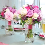 Doubling as a wedding reception accessory and a super cute bridesmaid gift, our Flower Bouquet Reception Vases are a brides best friend! Both statuesque in form and stylish in appearance, these one of a kind floral vases provide a helpful service on your big day while remaining a treasured keepsakes for all your favorite girls all the days after! Simply place these vases at the head table to give the bridesmaids a place to keep their bouquets safe as they dance the night away! At the end of the evening, theyll gladly take home the personalized vase filled with their beautiful, floral arrangement. Details: Size: Measures 3 1/2 inches wide by 7 inches tall. Materials: Clear glass *Please Note: Hand blown glass may contain small bubbles. Engraving Options: The Flower Bouquet Reception Vase may be engraved with two script custom lines (max of 18 characters per line) at No Additional Cost.