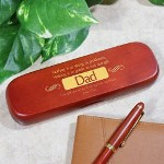 Your Dad has always been there for you. He has provided strength, compassion and knowledge to help you through lifes journey. Thank the strongest man you know with a handsomely Personalized Pen Set your Dad will enjoy for years to come. Engraved Pen Set for your Dad is presented with a matching rosewood case for convenient storage and makes a beautiful gift presentation. Pen measures 6" in length, black ink and features twist action ballpoint operation. The pen can be refilled with a standard Parker refill. The Engraved Dad Pen Case is personalized with any two line custom message. (i.e. I am glad youre my Dad and my hero, my friend. / Love, Terri )