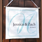 Designed to be a standout piece to your wedding day extravaganza, our Elegance Custom Banner will make any event more distinctive and fun! With its polished look, free personalization and vibrantly colored accents, this reception and ceremony decoration is easily completed by the color of your choice and overall styling... making it an incredible accent youll enjoy through the years. No matter how dramatic or quaint the setting, this is one wedding day accessory thats proving to be a must have for all! Custom banner comes complete with wooden dowel rod and two dowel caps for a truly distinctive, finishing look.