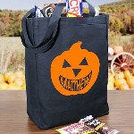 Your little trick or treater will have plenty of room for lots of candy and goodies. Enjoy Halloween even more this year with a Personalized Trick or Treat Tote Bag especially personalized with your little pumpkins name in pumpkin orange. Your Personalized Pumpkin Trick or Treat Bag is available on our premium black canvas cotton/poly blend, machine washable Tote Bag measuring 16"h x 15"w. Trick or treat sack includes FREE personalization with childs any name.