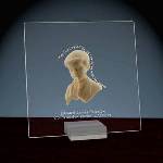 This beautiful glass plaque has rounded corners and is decorated with a sweet sculpture of a young boy praying that is made of stone resin. The plaque reads "May the love of Jesus Christ be with you always." and can be personalized with two lines of text. Acrylic display stand is included. Plaque measures 6 1/2" x 6 1/2".