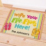 Welcome friends and family to your tropical home of fun, great food and good times. Makes a perfect housewarming gift. Flip Flops front door doormat is safe for outdoor door mat use. Our Beach House Doormat measures 18" x 24" and is 1/8" fleece smooth with latex action backing and white bound edging. Includes FREE personalization. Personalize your new Beach House Doormat with any one line custom text. (i.e. The Johnsons)