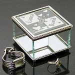This beautiful and classy Engraved Glass Jewelry Box will win the heart of your special lady. Perfect for Valentine’s Day, Sweetest Day, Weddings or Anniversaries, this Love Jewelry Box expresses your commitment to one another while each and every day. 