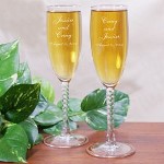 Two families are now one through the beautiful matrimonial ceremony between two loving people. Celebrate this glorious event with matching Personalized Champagne Flutes and your finest bottle of bubbly. A unique & elegant personalized wedding gift they both can enjoy for years. Your Engraved Wedding Champagne Glasses are available on Glitter Galore Toasting Flutes. The Personalized Champagne Flutes feature sparkling rhinestone accents along with nickel-plated metal stems and measure 10 1/8”H. Includes FREE Personalization! Personalize your Wedding Couple Flutes with any bride and grooms names and wedding date. 