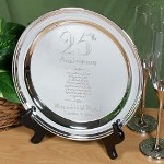 Honor your favorite married couple with a distinctive wedding anniversary gift by presenting them with an Engraved Wedding Anniversary Silver Plate. This beautifully engraved silver plated tray is the perfect gift for your loving couple. Your Personalized Wedding 25th Anniversary Plate measures 10" and is silver plated. Includes FREE Personalization. Personalize your Wedding Anniversary Plate with the married couples names and anniversary date. (e.g. Mary and Ralph Prymek / September 15, 2009 )