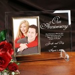Our Personalized Anniversary Beveled Glass is a heavy-weight glass with beveled edges on all sides, accented with golden brass frame trim. Frame measures 8" x 11" and holds your 4" x 6" photo; includes clear easel legs for top display. Includes FREE Personalization! Anniversary frame includes FREE Personalization! Personalized Anniversary Picture Frame includes ;anniversary couples names and anniversary date.