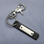 This black leather key chain has an engravable stainless tag with elegant matte finish and large lobster claw that can attach to a belt loop. Leather is 3 by 3/4 inches. Great for new driver gifts, gifts for dad, graduation or off to college gifts...