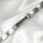 This stainless steel ID bracelet can be engraved on front and back with a name or special message to make this a gift that will be cherished forever. The engraveable area on front is a rectangular cavity filled in with black. The engraving will appear in a silver tone to match the stainless bracelet. 