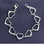 Celebrate a special holiday or gift giving occasion with our Tiffany style sterling silver heart bracelet.
