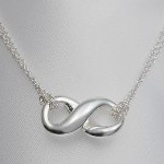 Show your love in an infinite way with our Tiffany style Infinity symbol necklace. Great for birthdays, anniversary gifts or just because...