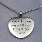This heart pendant is pre-engraved with the message: When I count my blessings I count you twice. What a wonderful gift to give to the special someone in your life. Back of heart is engravable. Choose traditional (etched in) engraving or black laser engraving.