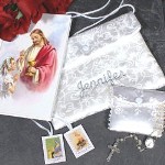 our precious daughter will complete her First Communion outfit with this stunning Personalized First Communion Purse. A splendid personalized religious gift to celebrate this joyous occasion with the Lord and family. She can proudly follow along with the mass using her First Mass Book and say her prayers with a lovely faux pearl rosary. A complete First Communion Gift Set she is sure to love and cherish forever. Your Embroidered First Communion Purse & Mass Book Gift Set includes an ornate satin purse embroidered with your daughters name in a soft silver thread. Also included in the gift set is a first mass book, scapular plus a faux pearl rosary with small satin case. The embroidered purse measures 5 1/4" x 7" and is light weight, perfect for your daughters First Communion at Church. Includes FREE Embroidery. Personalized your First Communion Purse with any name ( ie. Jennifer )
