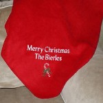 Decorate your favorite, comfy chair or wrap up and stay nice and toasty warm in your familys Personalized Christmas Candy Cane Blanket. A festive red, fleece blanket sure the be a favorite with everyone this Christmas season. An embroidered Christmas blanket also makes a lovely Christmas gift for neighbors and close friends. 