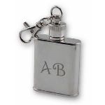Remember a special traveler with an innovative gift idea when you choose our unique stainless steel flask key chain. Totally durable, of quality stainless steel, this intriguing travel gift is designed in the shape of a flask with a hook-style ring for holding keys. Flask key chain is perfect for convenient carrying and storage while traveling - weighs only 1 oz. and is 2 1/5 x 1 3/4" in size, to fit easily into a pocket or into a small purse. Create a lasting memory when you include personalization with recipients initials to make an elegant engraved travel gift that will ensure you are always remembered. Appropriate for both business and leisure travelers.