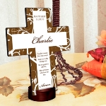 Our attractive Tree of Life Personalized Cross is simple yet classic, featuring a brown wood-grain background with delicate white flowers. Appropriate as a wedding or baptismal gift, or even as a housewarming present. Available in different styles. Stand included for more display options. Cross measures 6 3/4" x 5 1/8" x 1/4". Stand measures 1 3/4" in diameter and stands 3/4" tall. Personalize with a name of up to 20 characters, an event of up to 15 characters and date (MM-DD-YY format). 