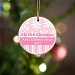 Celebrate the first Christmas of that precious bundle of joy with our pretty personalized holiday ornaments. A delicate addition to any tree, our ceramic, snowflake-adorned ornaments are available in three colors. Start a tradition and hang this unique personalized First Christmas ornament on the tree every year! Ornaments measure 3" in diameter and are ready for hanging with a gold metallic cord. Personalize with childs name of up to 20 characters and holiday year.
