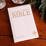 Allows for up to two lines of personalization. Help the Catholic child learn more about his/her faith with this excellent introduction to Gods word, our Personalized Catholic Childrens Bible. With easy-to-read text and vibrant illustrations, this Bible boasts a soft white or maroon vinyl cover, gold stamping, edging and ribbon and is perfect for daily reading or reading together.
