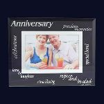Anniversaries are a time of celebration and remembrance of years gone by. What more perfect way to show them you respect their journey of marriage then with this beveled glass frame. The outer frame is decorated with words of love and affection for the happy couple Put a favored picture of them both inside or let them choose their favorite image. Either way they will display this thoughtful gift in a special place for years to come. Glass photo frame measures 9” x 7” and holds a 4 x 6 photo.