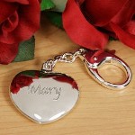Warm her heart with this elegantly engraved Silver Heart Keychain this Valentines Day. An unique gift which makes a wonderful token of your love and affection while serving as a practical personalized gift. Remember you can also present your Mom, Grandma or Nana with this distinctive silver plated heart keychain; a fabulous engraved gift for birthdays or graduation gifts. 