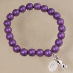 This irresistible accessory features an array of purple glass beads and a dangling silver awareness ribbon charm. Measuring 8” to fit most wrists. Each Engraved Charm Bracelet for Epilepsy includes FREE Engraving! We will Engrave the Charm with any initial.(ie.H) 