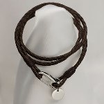 This Black Leather Bracelet comes with a round stainless steel charm. Engrave an initial, three letter monogram or short message. Two leather strand wraps twice around wrist. Lobster clasp. Each leather strand is 4mm wide. Total width is 8mm. When unwrapped, this bracelet is 17 1/2 inches. When wrapped around wrist, it is 7 1/2 inches. This stylish and trendy bracelet makes a keepsake gift for any birthday, graduation or special celebration. It is a wonderful gift for both teens, young adults and women. 