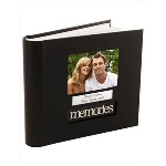 A deluxe faux leather photograph album that is ideal for any occasion be it a birthday, housewarming, anniversary or any other special event. The album reads “Memories”, perfect for keeping images of your fondest memories. This handsome personalized album will hold two hundred 4” x 6” photos along with a personal message on two lines of text beneath a photo of the recipients. Album measures 10" x 2" x 8.75". 