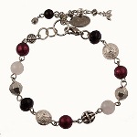 Semi precious and crystal beads adorn these rosary style bracelets. Light and easy to wear,you can wear one or a whole bunch together for a chunky fun look. Made in USA 