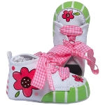 New hand-painted baby shoes offer a whimsical twist on the classic hi-top pre-walker. With special ribbons and laces - and a little extra sparkle - these tiny works of art make an unforgettable and playful keepsake gift. 