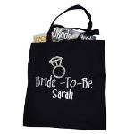 Something Old, Something New, Something Borrowed, Something Blue and so Much to do. How about keeping everything together in our Personalized Bride Tote Bag. This sturdy, black tote bag is sure to be her favorite while planning this once-in-a-lifetime event.