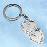 Our Engraved Silver-Plated Double Heart Key Chain with glistening cubic zirconia accents measures 1 " x 2 3/4" and makes a great gift for the holiday season, anniversary gift or birthday or special occasion gift idea.