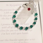 This delicate and keepsake bracelet is a beautiful gift idea to give to your Godchild on baptism/christening day or for a First Holy Communion Gift. The bracelet is created with swarovski crystals and a sterling silver clasp and chain. The Godchild birthmonth color and clear crystals create the bracelet and the birthmonth color of the Godparent hang next to the clasp. 4" or 5" is an infant size recommended for baptisms or christenings. 6" is recommended for First Communion gifts. Each bracelet includes an adjustable clasp that extends the bracelet another 1 - 1/2" (for example - the 4" bracelet is 4" of beads and 1 - 1/2" of extender chain).