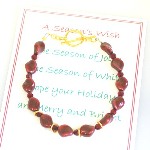 A thoughtful gift idea for the women on your shopping list. Our holiday gift bracelet with gold tones sets the tone for the holiday and new year. Wishes of happiness, health and love to wear all year long.