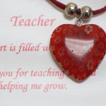 This red heart teacher necklace is a special gift to give to a teacher during the holidays or as a thank you for a great school year. Your heart is filled with kindness. Thank you for teaching me and helping me grow. Italian style glass pendant on a leather style cord with an adjustable clasp. 