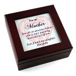 Make this Mother’s day a day she will never forget by showing your mom how much you love her with our heartfelt Mahogany Keepsake box. This beautifully inscribed box includes a short and sweet message imprinted with a heart along with an additional 2 lines of personalization. This box will look beautiful on your Mother’s dresser and her face will light up every time she opens it to store her jewelry, keys, or any other keepsakes.