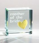 Honor Mom your wedding day with a gift of appreciation and kindness. The Mother of the Bride Gold Heart Crystal keepsake is a wonderful way to say thank you.  A fun gift to give to the mother of the bride on your wedding day. Size: 1.2x1.2x0.7 inches 