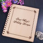 Give Mom, Grandma, Aunt or your Sister this Engraved Holiday Recipe Holder to safely store all her famous recipes. From Thanksgiving to Christmas or any special occasion, she is sure to appreciate the thought of keeping her secret recipes clean and safe enough to use year after year. Our Personalized Holiday Wood Recipe Album measures 7 2/3" x 8 3/4" and holds 72, 4" x 6" Recipe Cards. Includes FREE Personalization! Personalize your Recipe Album with any name. 