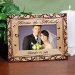 A Personalized Wedding Couple Picture frame makes a lovely impression on a new bride and grooms special day. This Engraved Picture Frame features fluid ornamentation with a traditional presentation. Present the newlywed couple with their first Personalized Wedding Picture Frame displaying their magical wedding date & married couples names.